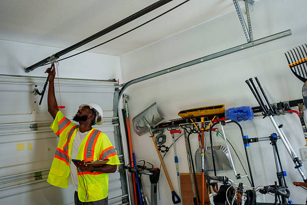 Professional Garage Door Panel Replacement technician working in Sterling City, TX